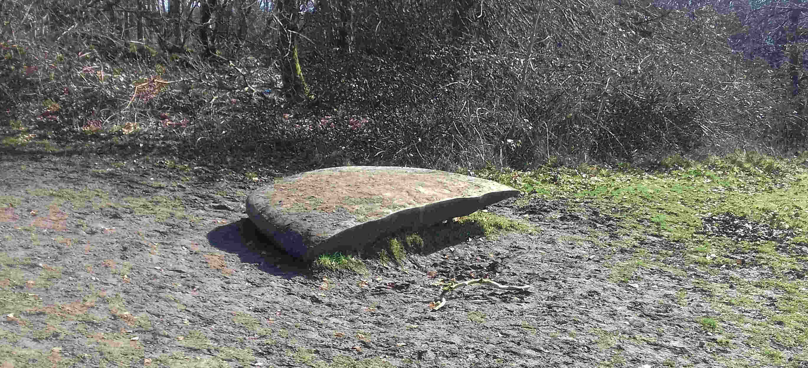 Part of a memorial to a USAF WW2 B17G Flying Fortress bomber which crashed into the hill in poor visibility on 19 March 1945 with the loss of all 9 crew. Much climbed on by children, its gets very muddy, the memorial represents a wing tip of the doomed plane.